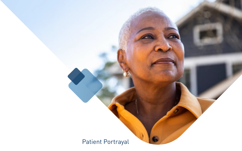 Patient portrayal of adult African-American woman looking into distance.
